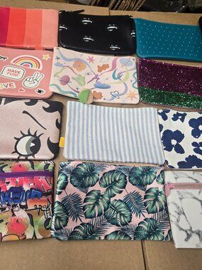 Lot of 15 ipsy bags great assortment all new never used check out the pics